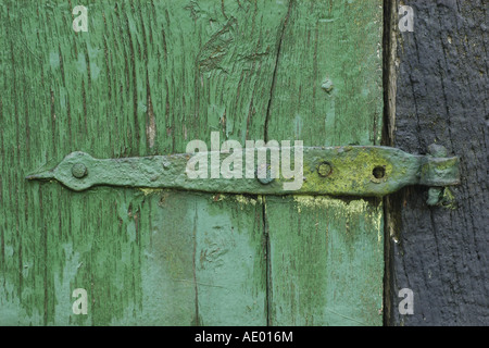 old doorhinge on an weathered door, Germany, Lower Saxony, Bad Essen Stock Photo