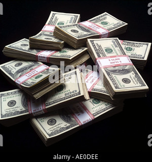 STACKS OF ONE HUNDRED DOLLAR BILLS Stock Photo