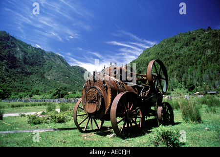A19th Century British steam engine used to power farm equipment lies abandoned in a field in Chile, South America Stock Photo