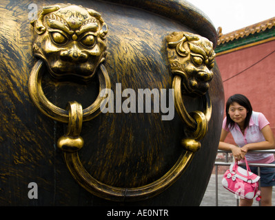 Detail of ornate brass handles on relic inside Forbidden City in Beijing 2007 Stock Photo