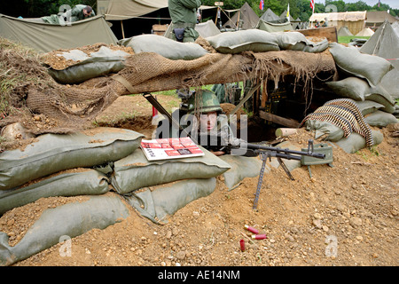 Re-enactment, War and Peace Show. German Tiger tank approaching at speed  with tank commander in turret. Motion blur on tracks, dust behind tank  Stock Photo - Alamy