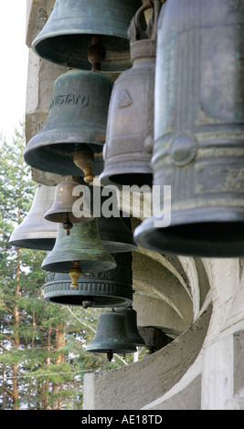 bell temple religion outdoor ringing consider sacred culture metal ritual while singing close up hanging carillon heavy ring Stock Photo