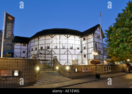 Dusk view of Shakespeare's Globe theatre on the south bank of the Thames river in London. Stock Photo
