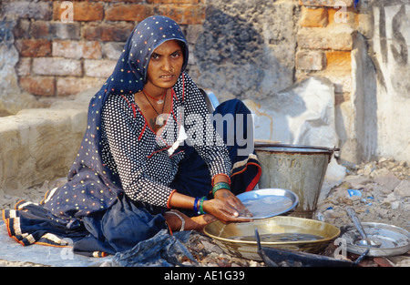 indian women at the houswork, India, Uttar Pradesh Stock Photo