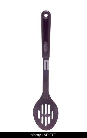 Slotted Cooking Spoon Silhouetted on White Background Stock Photo