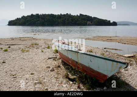 Old boat abandoned on beach Nidri Lefkas Greece Stock Photo