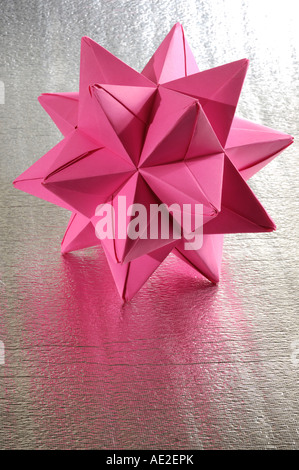 Origami abstract paper figure polyhedron Stock Photo