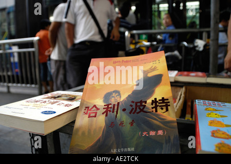 Fake Harry Potter books for sale on a Beijing street corner 17 Aug 2007 Stock Photo
