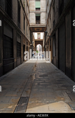 Narrow old street in the Bari Gothic district of Barcelona Spain Stock Photo
