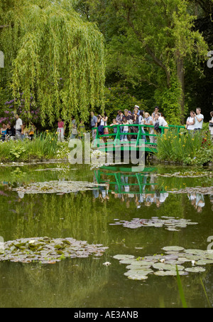 visitors in the water garden at Monets garden at Giverney Stock Photo
