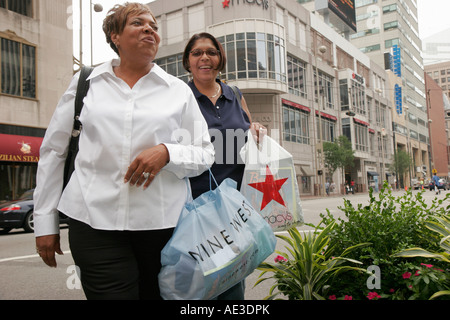 Cincinnati Ohio,Fountain Square,smiling,Black women,shopping shopper shoppers shop shops market markets marketplace buying selling,retail store stores Stock Photo