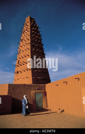 Iman and mud brick Minaret and Mosque Agadez Niger Stock Photo
