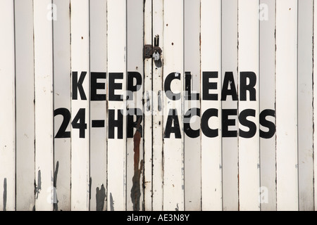 keep clear sign on metal doors taken in birmingham uk Stock Photo