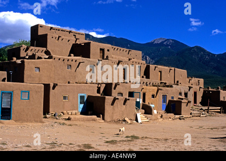 Turquoise doors adorn adobe residences  in Taos Pueblo, a UNESCO World Heritage Site in New Mexico, United  States. Stock Photo