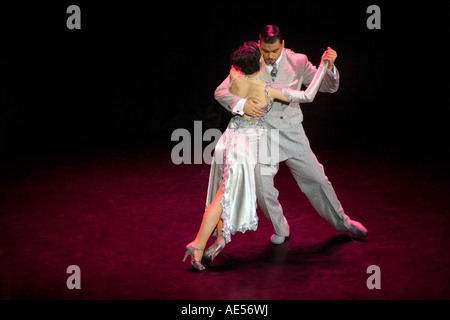 Buenos Aires tango dancers. Couple dancing the tango on stage in La Esquina de Carlos Gardel theater dinner spectacle show. Stock Photo