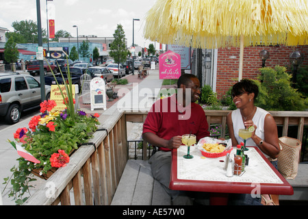 Richmond Virginia,Carytown,West Cary Road,Black Blacks African Africans ethnic minority,couple,adult adults man men male,woman women female lady,eatin Stock Photo