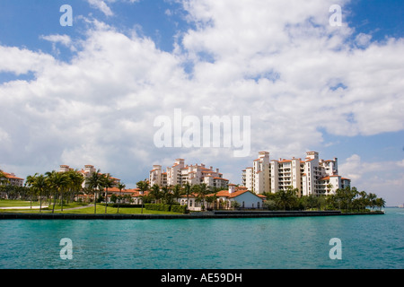 Ultra expensive luxury condominiums on exclusive Fisher Island as seen from Biscayne Bay in Miami Florida Stock Photo