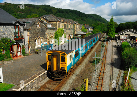 Arriva diesel train arriving at Betws-y-Coed railway station Gwynedd Snowdonia North Wales Stock Photo