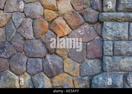 Wall made of large stones of earth tone colors Stock Photo
