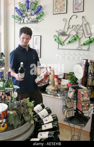 Chesapeake Virginia,Carafe Wine Makers,White man,male,shopping shopper shoppers shop shops market markets marketplace buying selling,retail store stor Stock Photo