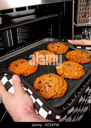 MAN BAKING COOKIES Stock Photo
