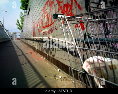Shopping trolly used by homeless person on a Manchester underpass with