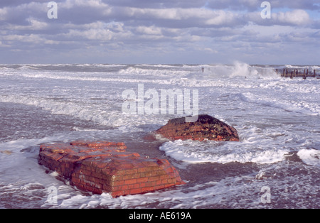 RELICS OF OLD HAPPISBURGH LIGHTHOUSE ON BEACH AT HAPPISBURGH NORFOLK EAST ANGLIA ENGLAND UK Stock Photo