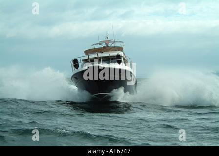 Running shots of Francois Citron a Storebro 475 Royal Commander motor Yacht in East Solent out of Christchurch Dorset Stock Photo