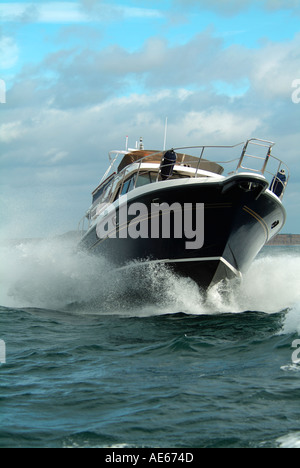 Running shots of Francois Citron a Storebro 475 Royal Commander motor Yacht in East Solent out of Christchurch Dorset Stock Photo