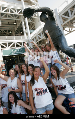 Ohio Cuyahoga County,Cleveland,Jacobs Field,Cleveland Indians baseball,girl girls,youngster,female kids children softball team,fans,Bob Feller statue, Stock Photo