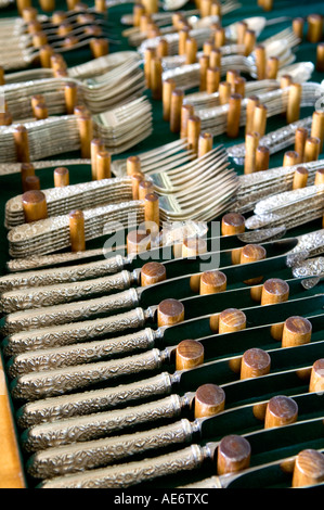 Silver cutlery on display Stock Photo