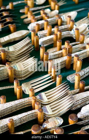 Silver cutlery on display Stock Photo