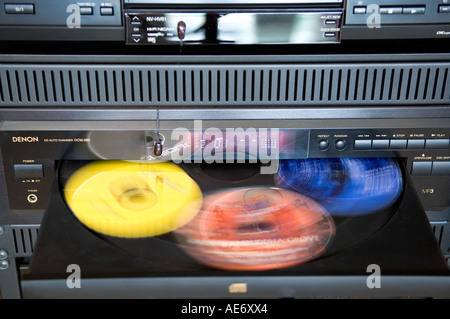 5-disc CD changer with spinning discs Stock Photo