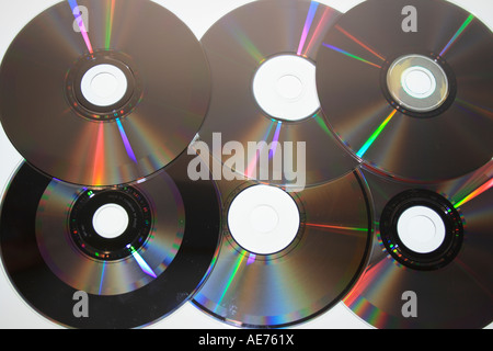 six compact discs  reflecting light. Photo by Willy Matheisl Stock Photo