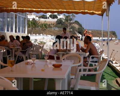 People Eating in a Chiringuito, La Cala De Mijas, Costa del Sol, Spain Stock Photo