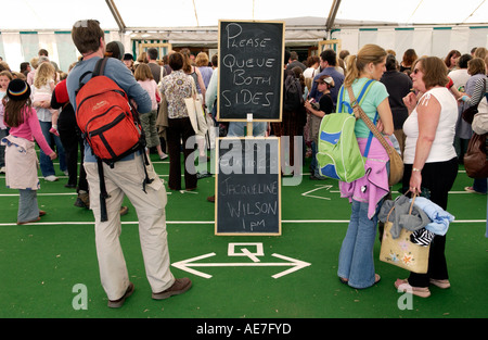 Fans of childrens author Jacqueline Wilson queue for her to sign books at The Guardian Hay Festival 2006 Powys Wales UK Stock Photo