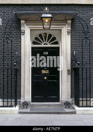 Light bulb on above 10 Downing Street black door to the official residence of the Prime Minister in Whitehall district Westminster London England UK Stock Photo