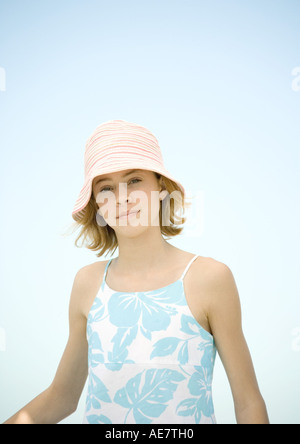 Portrait of preteen girl with hat on white background Stock Photo - Alamy