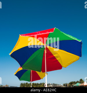 two beach umbrellas against Pacific blue sky/2 Stock Photo