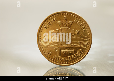 Nepalese gold coin hi-res stock photography and images - Alamy