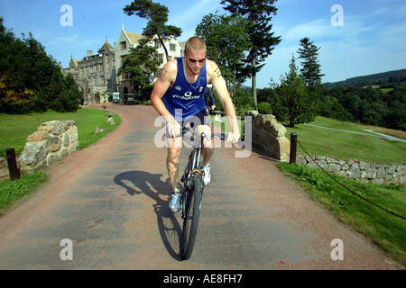 England cricketer Andrew Freddy Flintoff training at the Bovey Castle Hotel on Dartmoor with trainer Dave Rooster Roberts Stock Photo