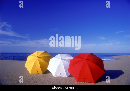 Three umbrellas on the beach Property released image Stock Photo