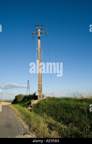 Electricity pylons in the french countryside under a clear blue sky ...
