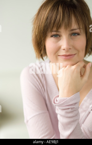 Young woman looking at the camera Stock Photo