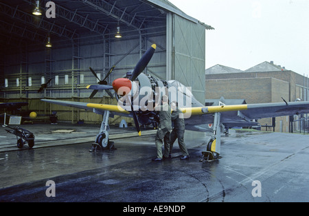 Mechanics are to start engine of Kawasaki Ki-100 Type 5 Imperial Japanese Army Fighter in RAF St Athan Stock Photo