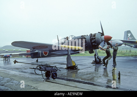 Mechanics prepare to start engine of Kawasaki Ki-100 Type 5 Imperial Japanese Army Fighter in RAF St Athan Stock Photo