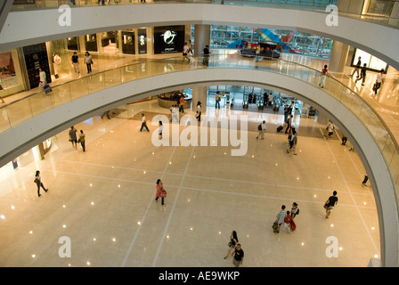 People Shopping and Enjoying inside IFC in Hong Kong Stock Photo