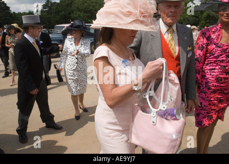 Posh English wealthy people UK Ladies Day at Royal Ascot, horse racing. Queuing up to go in. The social summer season Berkshire England 2006 2000s Stock Photo