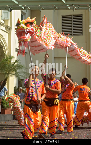 Professional dancers doing a Dragon Dance for the Chinese New Year celebration. Stock Photo