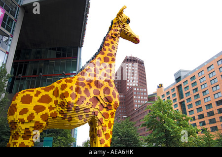 large figure TOY Giraffe made of lego brick ahead of SONY CENTER BERLIN
